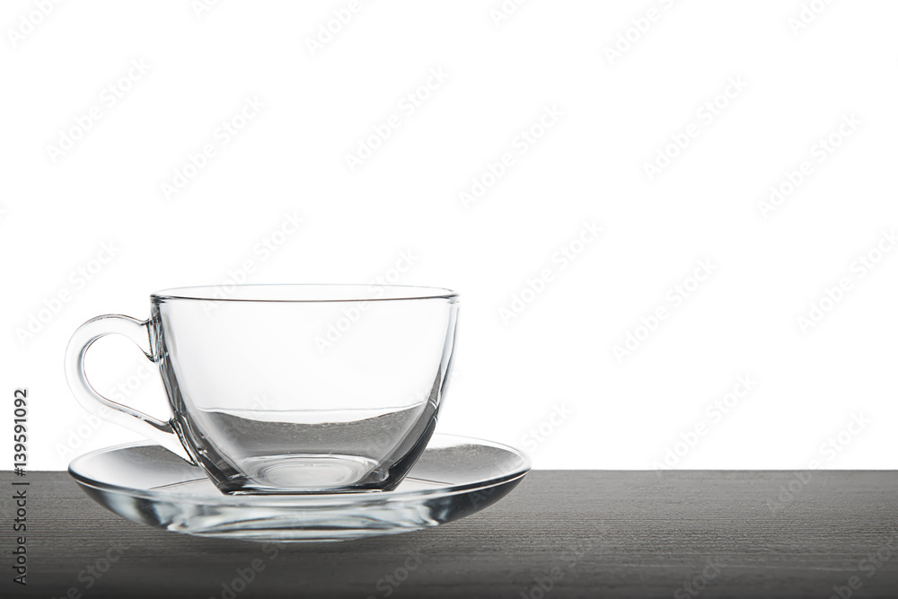 empty transparent tea cup isolated on wooden over white background, mock up empty transparent tea cup isolated on wooden over white background, mock up