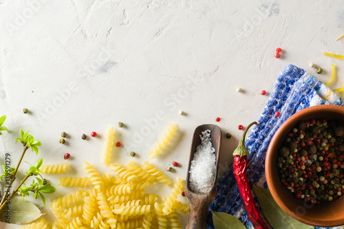 Bright picture with different varieties of pasta and Lasha. Spices and seasonings for cooking. photo