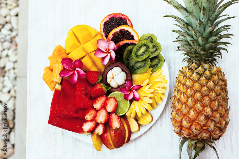 Fruit plate and pineapple top view