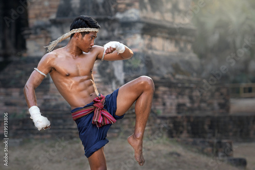 Man practicing Muay Thai photo