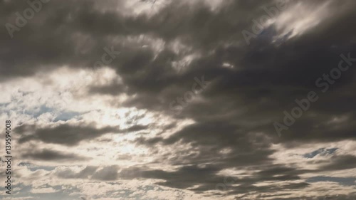 Sunrise clouds revealing sun