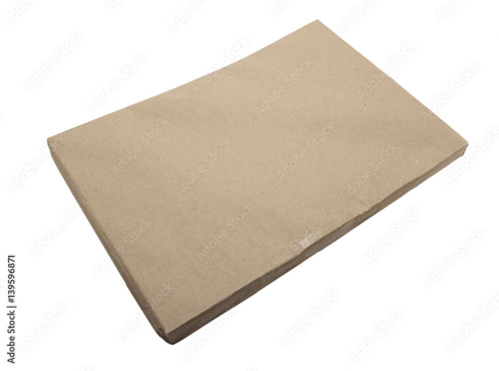 Brown craft paper pack isolated on the white background Brown craft paper pack isolated on the white background