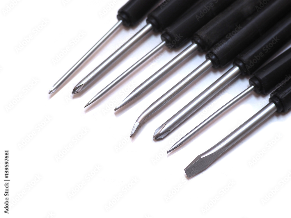 Screwdrivers set. Closeup different size of a Screw Drivers isolate on white background. on white background. Screwdrivers set. Closeup different size of a Screw Drivers isolate on white background. on white background.