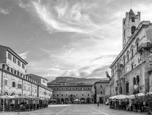 The beautiful Piazza del Popolo square in the historic center of Ascoli Piceno, Marche, Italy, in black and white