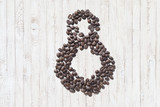 Coffee beans in form of number eight and on beautifull wooden background. International women's day. 8th march