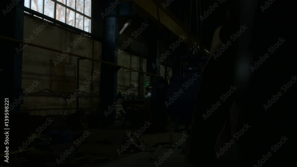Welding Process with Bright Sparks Through Large Pipe Hole Welding Process with Bright Sparks Through Large Pipe Hole