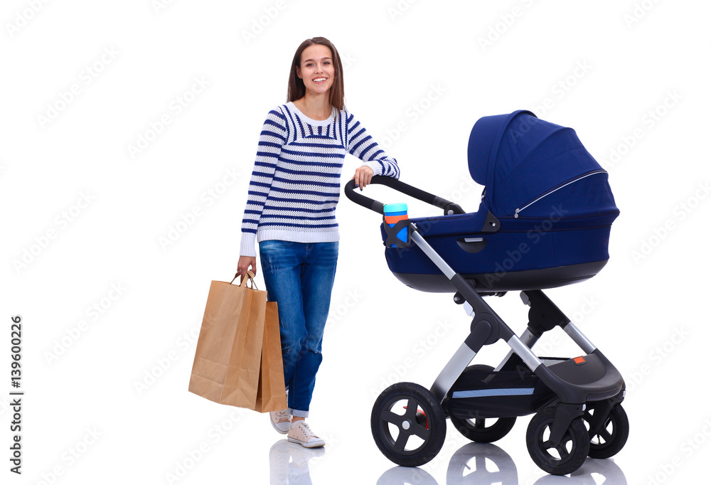 Full length portrait of a mother with a stroller, isolated on white background Full length portrait of a mother with a stroller, isolated on white background