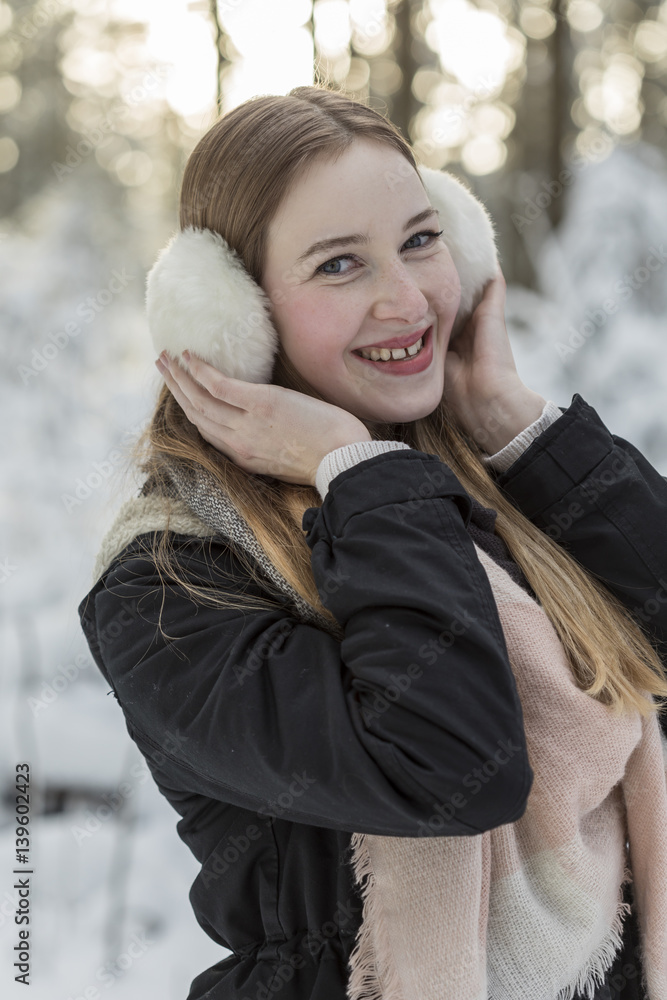 young woman snow walk beauty portrait fun smile candid young woman snow walk beauty portrait fun smile candid