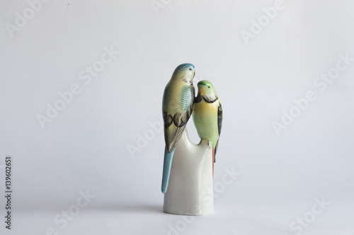 Colorful parrots porcelain figurines photo