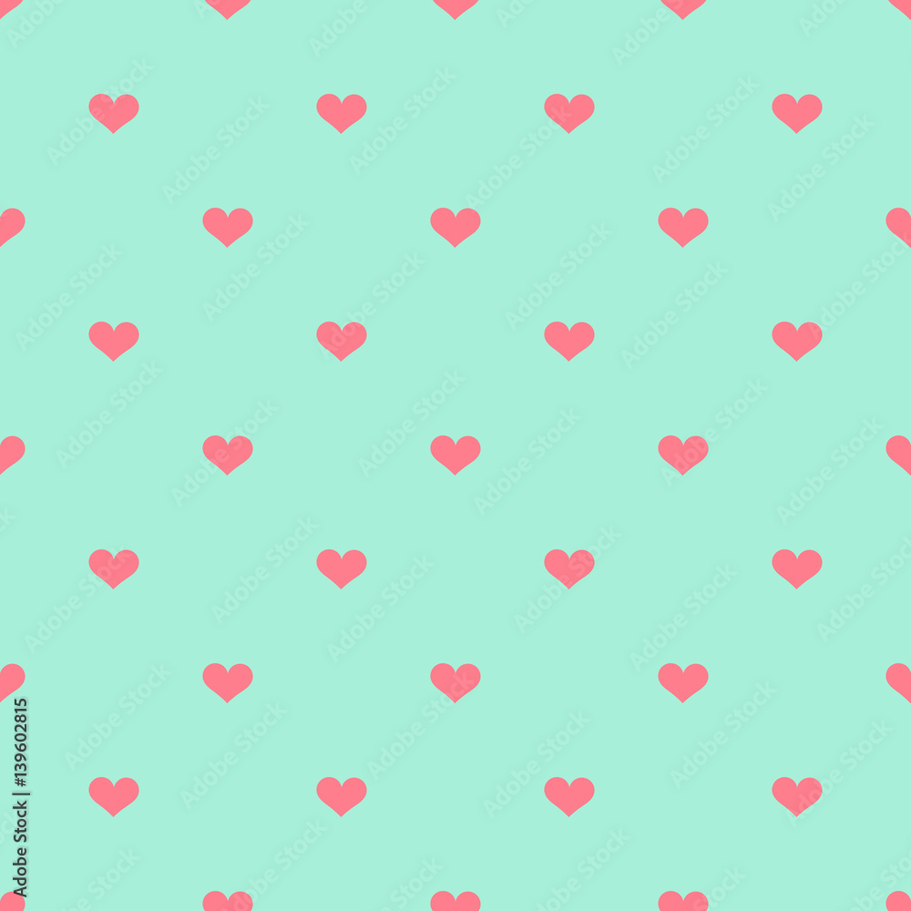 Pink hearts on blue background pattern