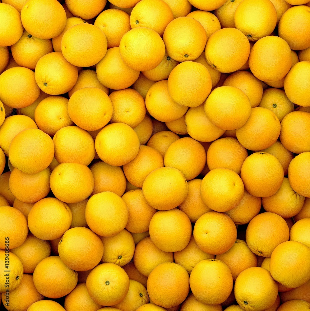 Close up on a large pile of oranges. Close up on a large pile of oranges.