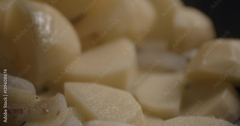 Potatoes slicing and cooking slowmotion close up – SOURCE: 4K 120 FPS PRORES 4444 12 BITS Potatoes slicing and cooking slowmotion close up – SOURCE: 4K 120 FPS PRORES 4444 12 BITS
