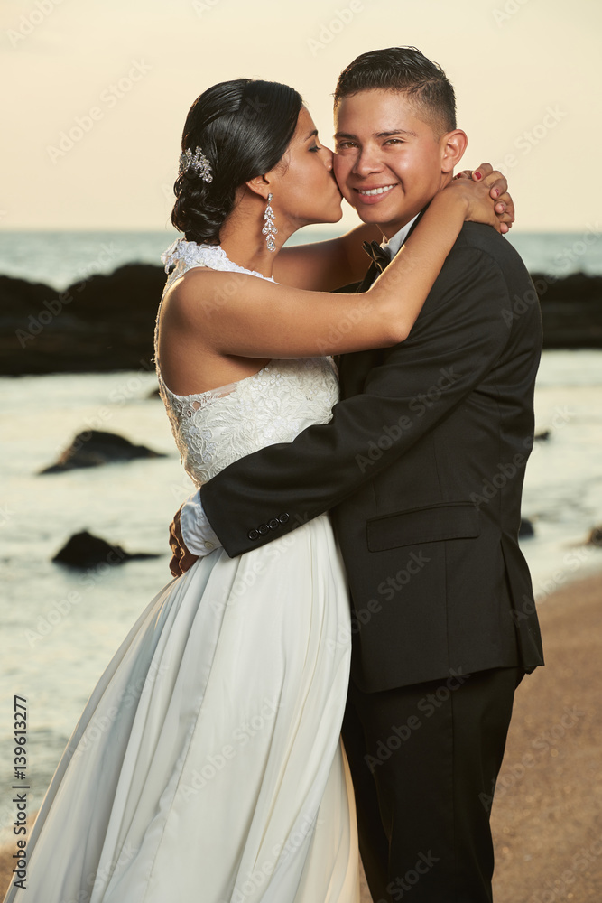 Portrait of hispanic wedding couple