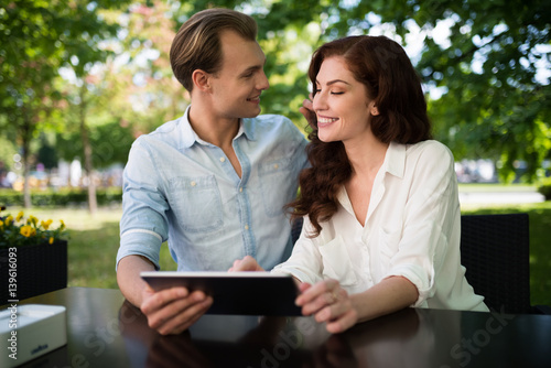 Couple using a tablet together