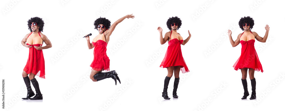 Man in female clothing singing with mic Man in female clothing singing with mic