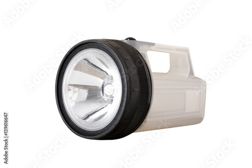 Flashlight with a large reflector. Isolated