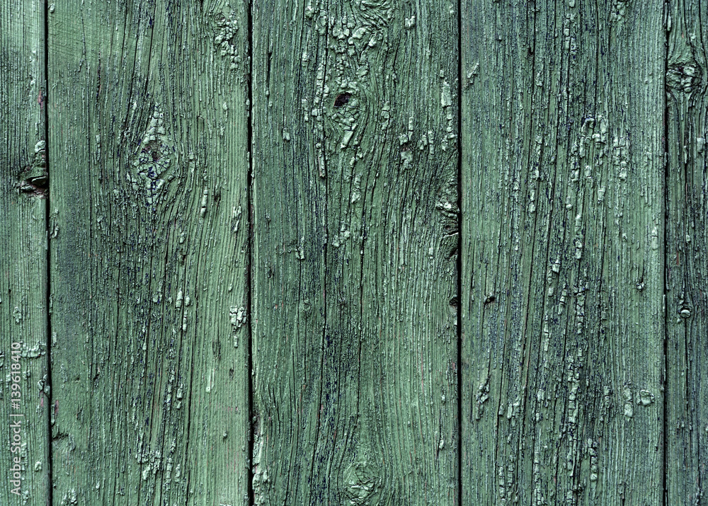 The texture of the boards in old green paint The texture of the boards in old green paint