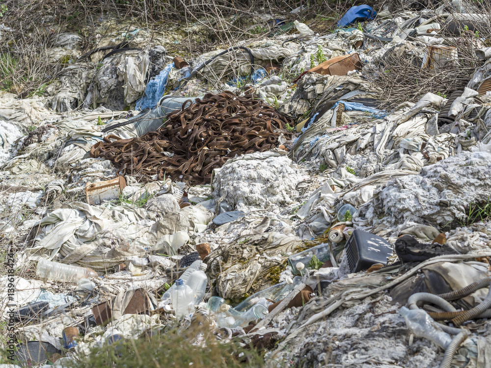 Obraz premium Environmental problem. Wastes which contaminate soils