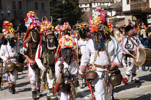 Shiroka Laka, Bulgaria - March 5, 2017: Traditional Kukeri costume at the Festival of the Masquerade Games Pesponedelnik in Shiroka laka, Bulgaria photo