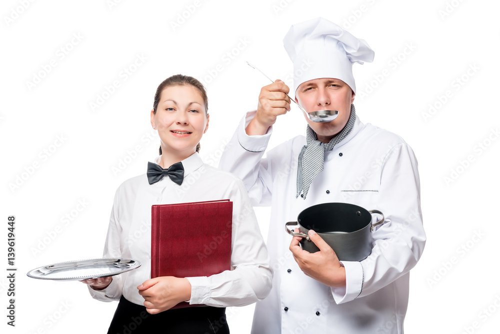 Cook tastes soup, the waitress holding an empty tray isolated Cook tastes soup, the waitress holding an empty tray isolated