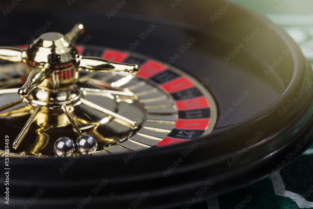 Image of decorative casino roulette. Focus on balls Image of decorative casino roulette. Focus on balls