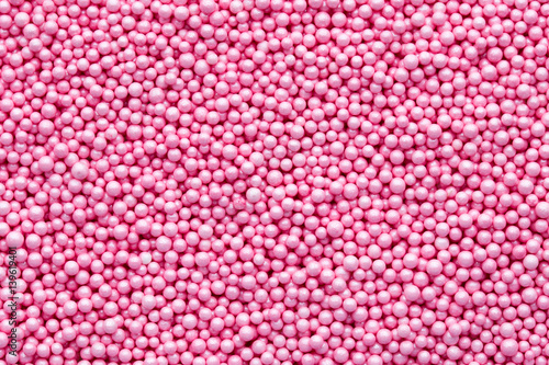 Fototapeta Naklejka Na Ścianę i Meble -  Multicoloured sweet sugar balls. Small ball pattern.