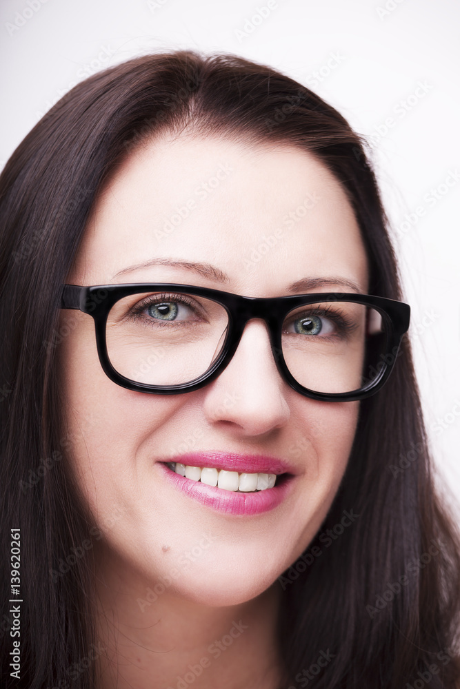 Beautiful young woman wearing glasses close-up isolated on white background. Beautiful young woman wearing glasses close-up isolated on white background.