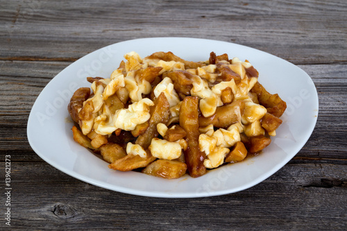 Poutine quebec meal with french fries, gravy and cheese curds
