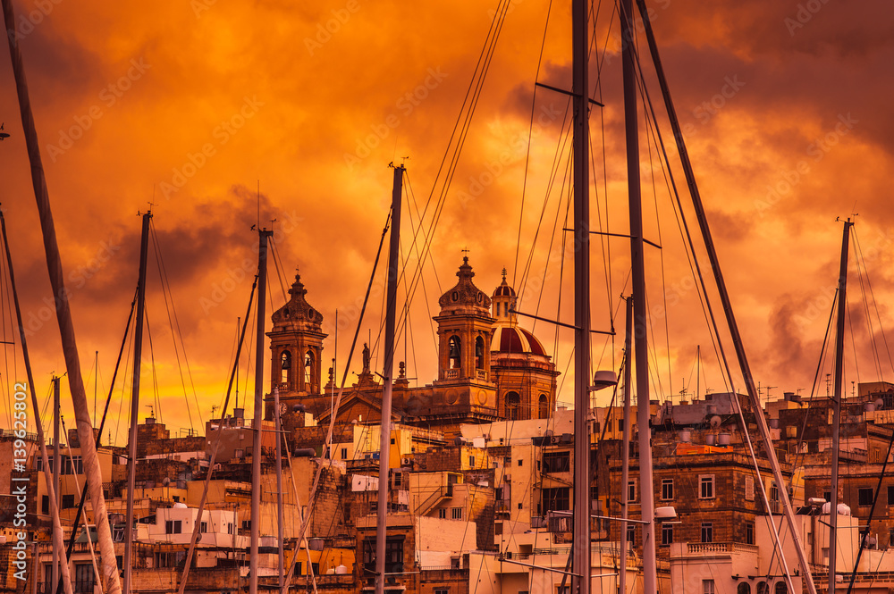 Orange evening in Senglea and Basilica of Our Lady of Victories