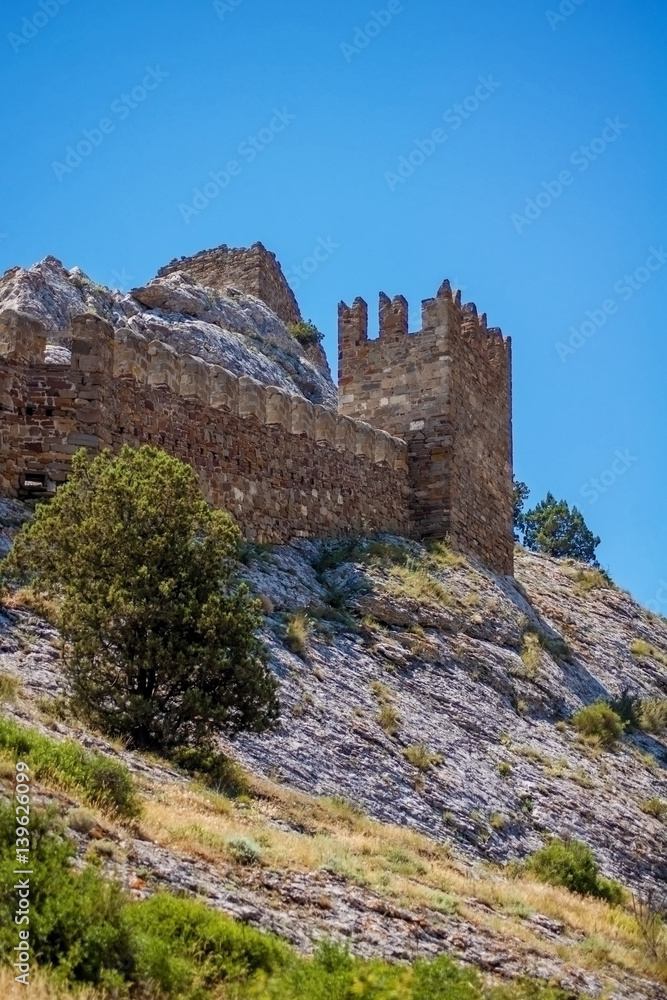Medieval fortress walls and towers.