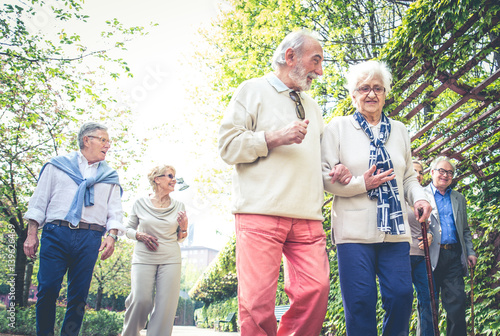 Senior people walking outdoors