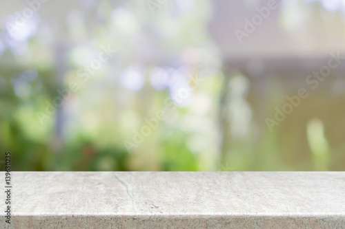 Empty top of natural stone, granite stone,marble table with Abstract natural color background. Natural Bokeh, mirror vintage effect. can use for product display advertising