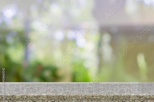 Empty top of natural stone, granite stone,marble table with Abstract natural color background. Natural Bokeh, mirror vintage effect. can use for product display advertising