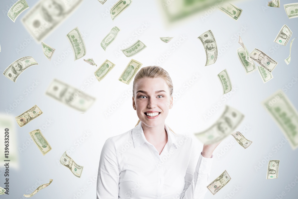 Happy blond woman and dollar rain Happy blond woman and dollar rain