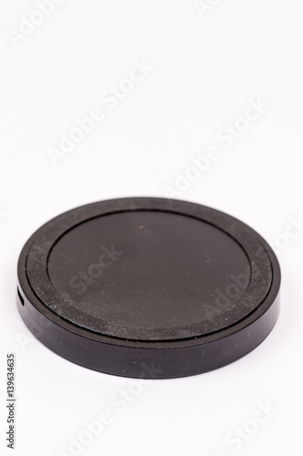 Black wireless mobile charger isolated over white background