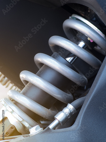 Shock absorber. Close up of a shock absorber in motorcycle racing. Selective focus.