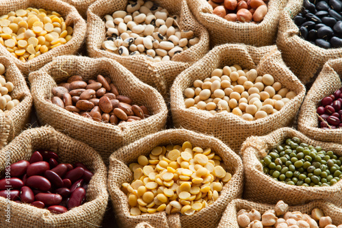 Fotografie Colorful Legumes, bean seed in linen sack