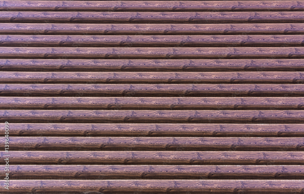 Wooden wall of the timber, with a very well-drawn texture Wooden wall of the timber, with a very well-drawn texture