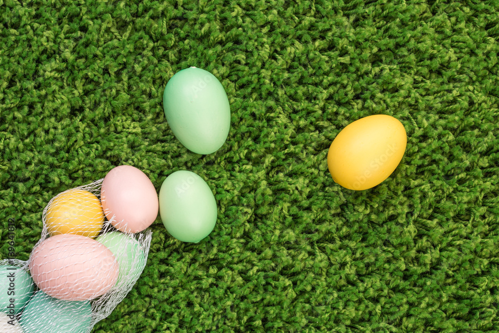 Easter spring eggs on green grass in plastic bag Easter spring eggs on green grass in plastic bag
