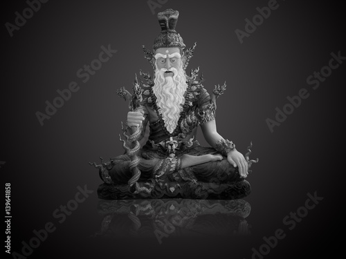 Black and white of Hermit statue isolate on gradient Black and white background