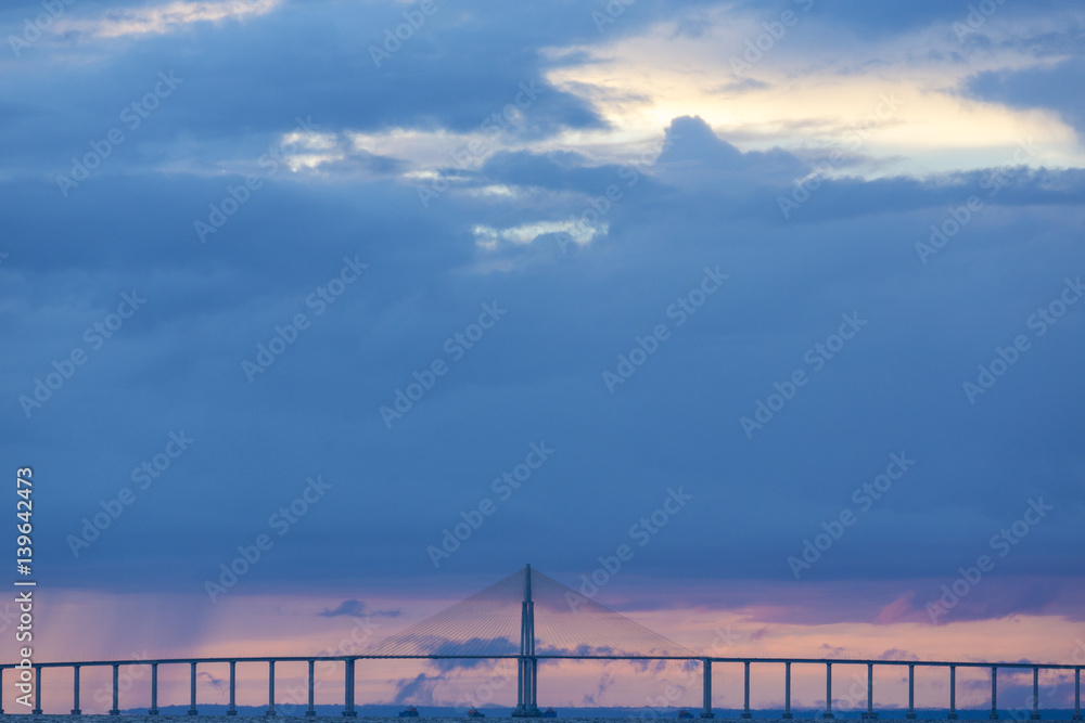 Sunset and Manaus Iranduba Bridge over the Amazon, Brazil