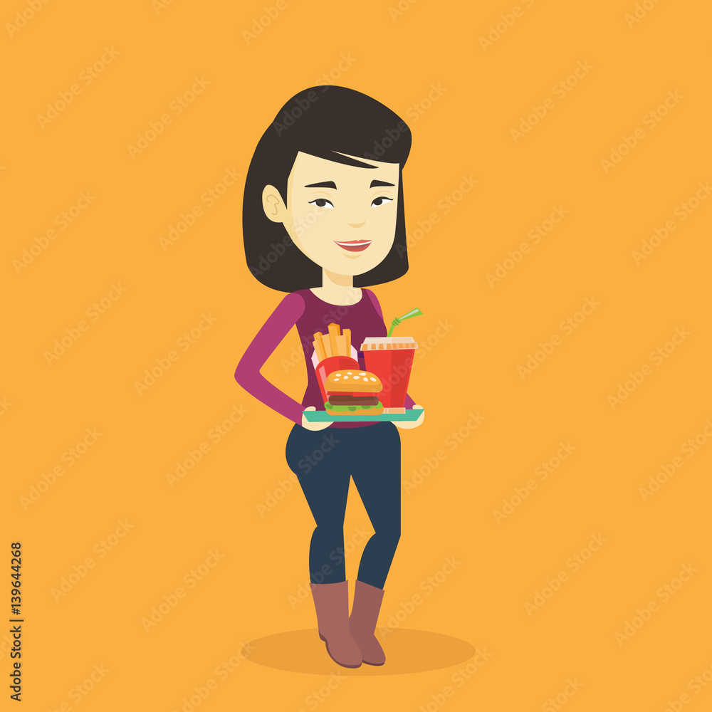 Woman holding tray full of fast food. Woman holding tray full of fast food.