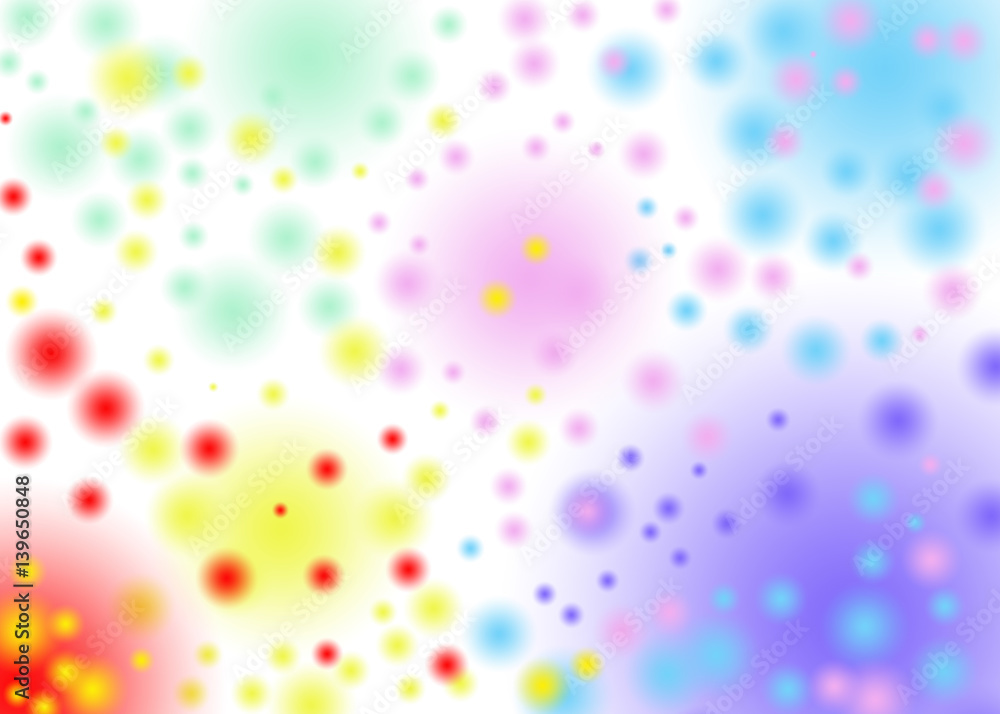 Abstraction of colored balls on a white background, blurred