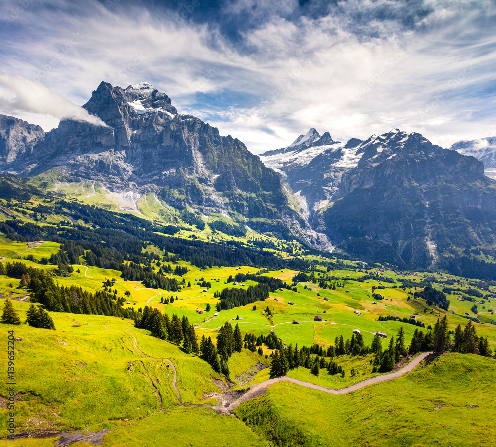 Colorful morning view of Grindelwald village valley from cableway.