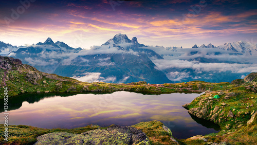 Colorful summer sunrise on the Lac Blanc lake with Mont Blanc (Monte Bianco) on background.