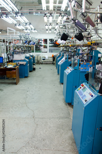 Machinery and equipment in a spinning production company interior design © klyuchinskaya