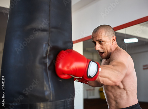Boxer with heavy bag © Xalanx