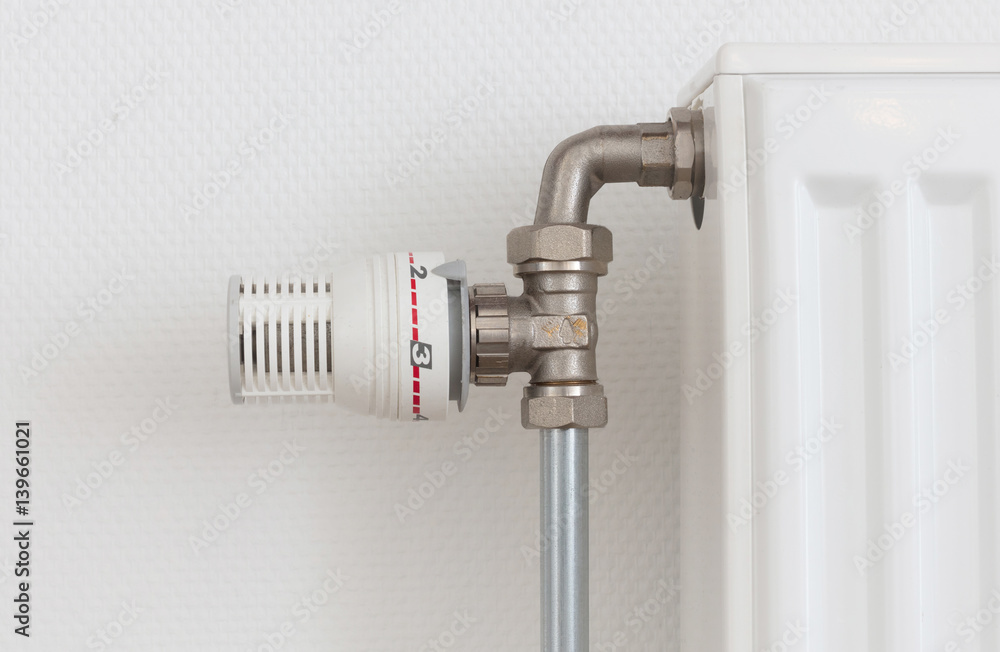 Temperature knob of heating radiator, used and dusty Temperature knob of heating radiator, used and dusty