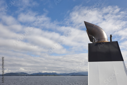 Norwegian ferry chimmey detail. Norway fjord landscape. Travel background. photo