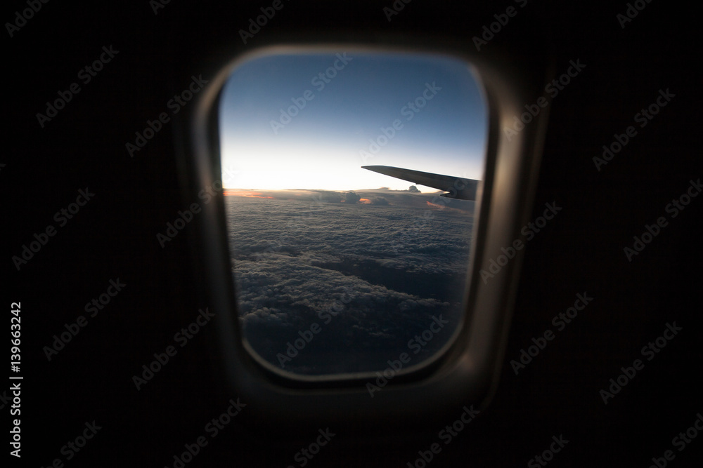 Fototapeta premium Sunrise view from window airplane